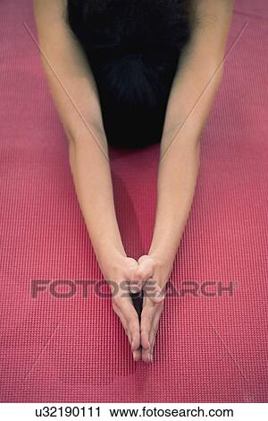 Yoga half tortoise pose View Large Photo Image Stock Image - Yoga half tortoise pose. Fotosearch