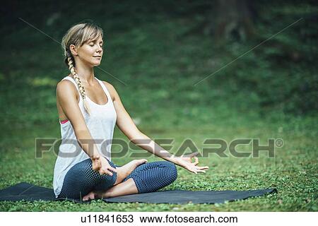 Yoga lotus position View Large Photo Image Stock Image - Yoga lotus position. Fotosearch