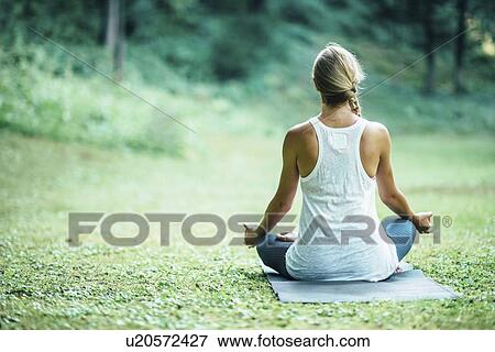 Stock Photo - Yoga lotus position. Fotosearch