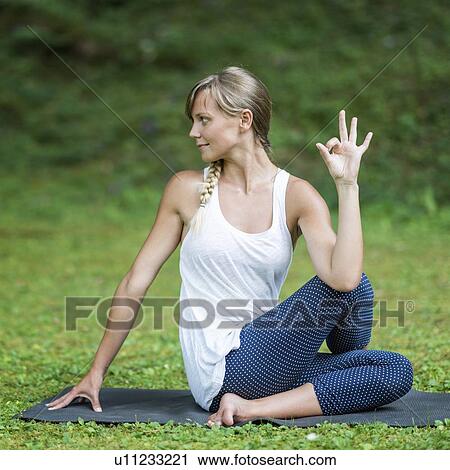 Stock Image - Yoga mudra hand sign. Fotosearch