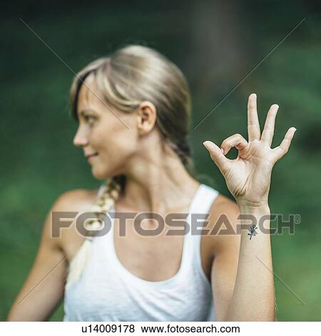Stock Photo - Yoga mudra hand sign. Fotosearch