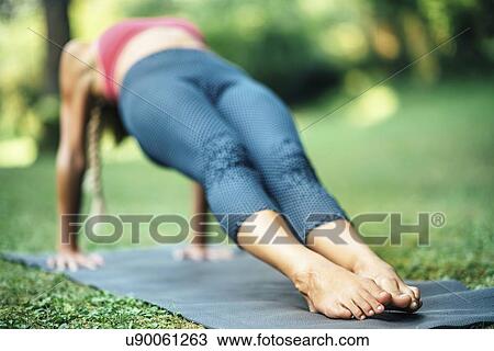 Stock Image - Yoga reverse plank pose. Fotosearch