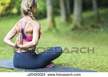 Yoga reverse prayer position View Large Photo Image Picture - Yoga reverse prayer position. Fotosearch