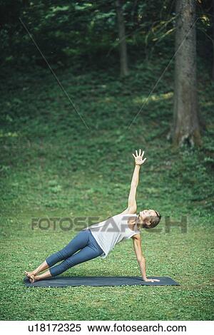 Yoga side plank View Large Photo Image Stock Photography - Yoga side plank. Fotosearch