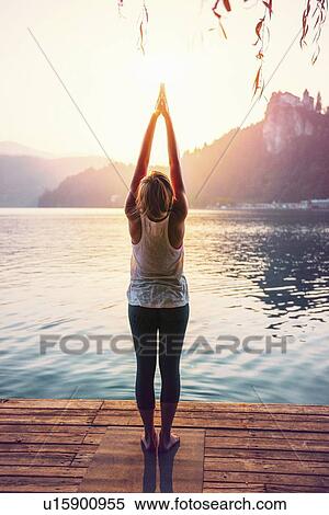 Yoga sun salutation View Large Photo Image Stock Photography - Yoga sun salutation. Fotosearch