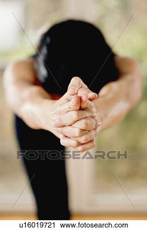 Stock Image - Yoga warrior three pose. Fotosearch