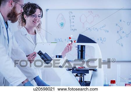 Young scientists in laboratory View Large Photo Image Stock Image - Young scientists in laboratory. Fotosearch