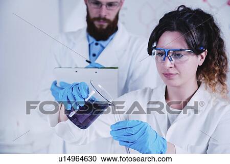 Young scientists working in laboratory View Large Photo Image Stock Image - Young scientists working in laboratory. Fotosearch