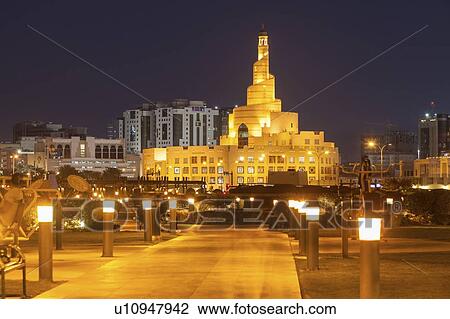 Stock Image - Abdulla Bin Zaid Al Mahmoud Islamic Cultural Center at night in Doha, Qatar. Fotosearch
