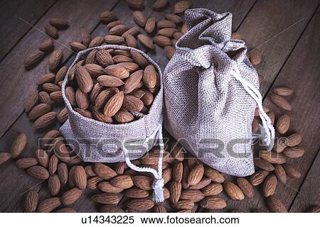 Stock Photography - Almonds in hessian sack.. Fotosearch