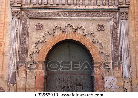 Stock Image - Arched gate in Marrakesh, Morocco. Fotosearch