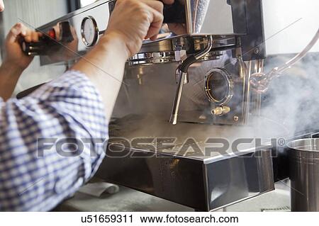 Barista using coffee machine View Large Photo Image Stock Image - Barista using coffee machine. Fotosearch