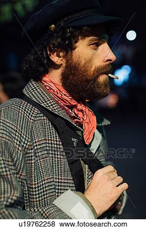 Bearded young man loitering on street View Large Photo Image Stock Photo - Bearded young man loitering on street. Fotosearch