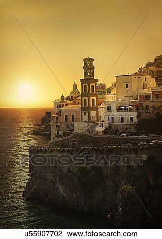 Bell tower by sea at sunset in Atrani, Italy View Large Photo Image Stock Image - Bell tower by sea at sunset in Atrani, Italy. Fotosearch