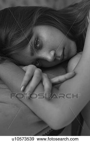 Stock Photo - Black and white portrait of young woman. Fotosearch