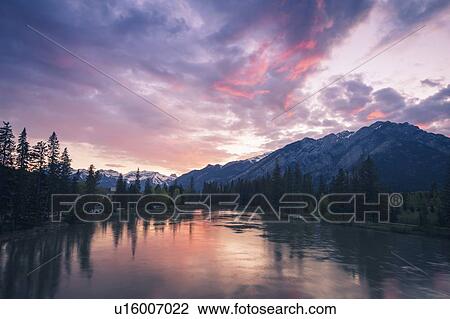 Stock Image - Bow River at sunset in Banff National Park, Alberta, Canada. Fotosearch