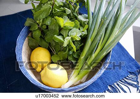 Bowl of mint, lemons and spring onions View Large Photo Image Stock Image - Bowl of mint, lemons and spring onions. Fotosearch