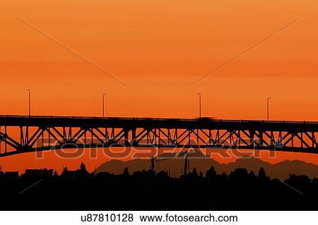 Stock Photo - Bridge at sunset in Seattle, Washington. Fotosearch
