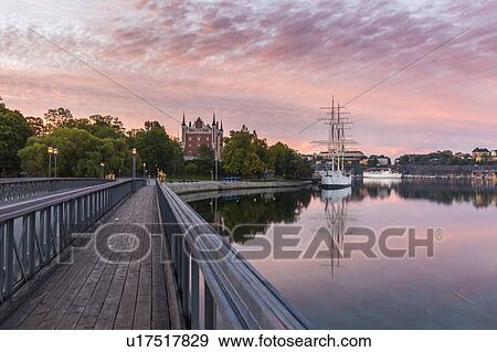 Stock Photo - Bridge by Admiralty House at sunset in Stockholm, Sweden. Fotosearch