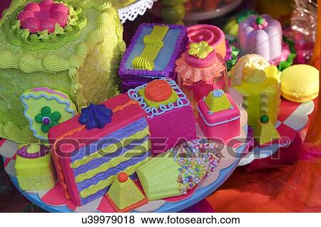 Stock Photo - Brightly colored cakes. Fotosearch