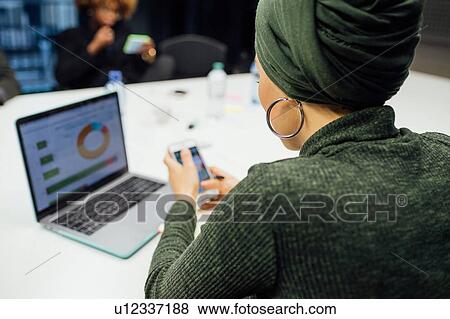 Business partners at meeting in office View Large Photo Image Stock Photo - Business partners at meeting in office. Fotosearch