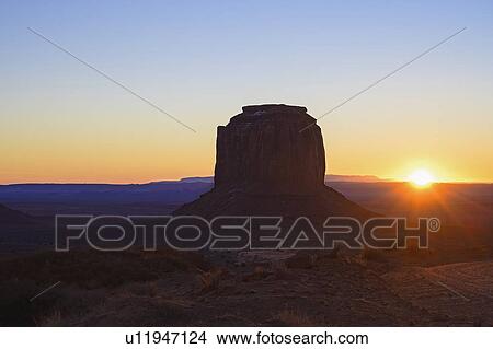 Butte at sunset in Monument Valley, Arizona, USA View Large Photo Image Picture - Butte at sunset in Monument Valley, Arizona, USA. Fotosearch
