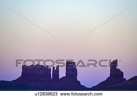 Buttes at sunset in Monument Valley, Arizona, USA View Large Photo Image Stock Image - Buttes at sunset in Monument Valley, Arizona, USA. Fotosearch