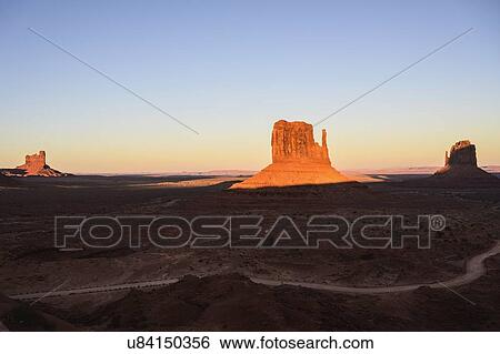 Buttes at sunset in Monument Valley, Arizona, USA View Large Photo Image Stock Photograph - Buttes at sunset in Monument Valley, Arizona, USA. Fotosearch