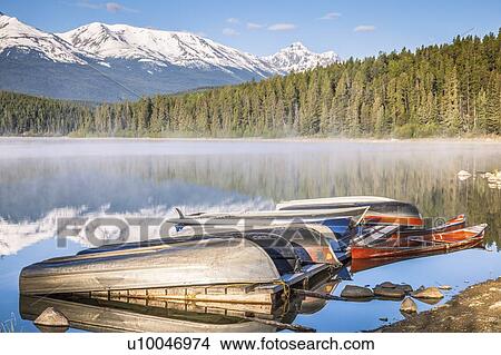 Canoes on Patricia Lake in Jasper National Park, Alberta, Canada View Large Photo Image Picture - Canoes on Patricia Lake in Jasper National Park, Alberta, Canada. Fotosearch