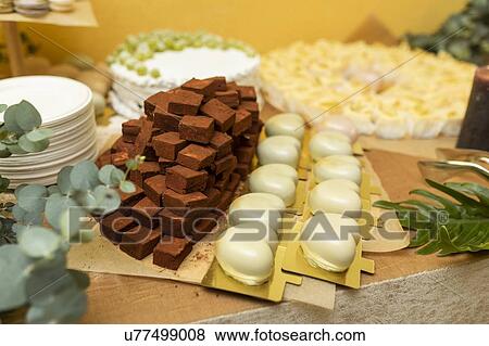 Chocolates on table View Large Photo Image Stock Photo - Chocolates on table. Fotosearch