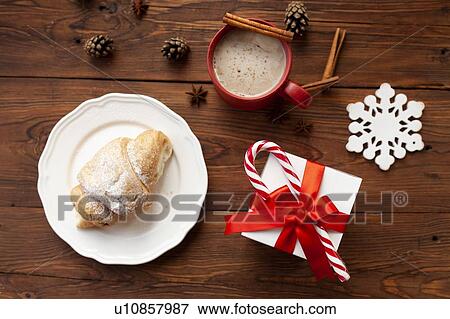 Stock Photo - Christmas present and croissant. Fotosearch