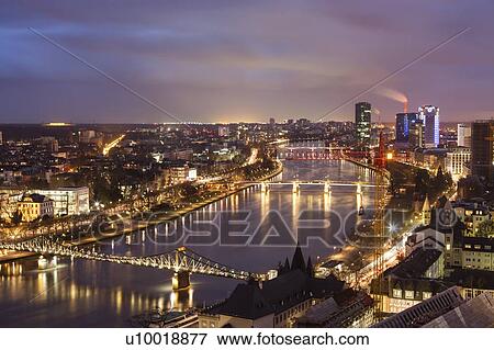 Stock Photo - Cityscape at sunset in Frankfurt, Germany. Fotosearch