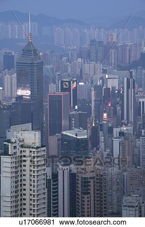 Cityscape at sunset in Hong Kong, China View Large Photo Image Stock Image - Cityscape at sunset in Hong Kong, China. Fotosearch