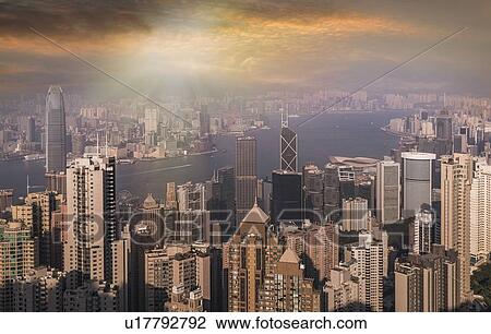 Cityscape at sunset in Hong Kong, China View Large Photo Image Stock Image - Cityscape at sunset in Hong Kong, China. Fotosearch