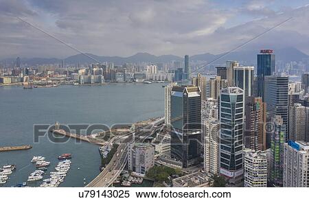 Cityscape by sea in Hong Kong, China View Large Photo Image Stock Photography - Cityscape by sea in Hong Kong, China. Fotosearch