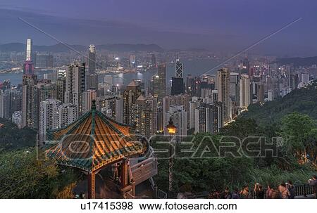 Cityscape from Victoria Peak at sunset in Hong Kong, China View Large Photo Image Stock Photo - Cityscape from Victoria Peak at sunset in Hong Kong, China. Fotosearch