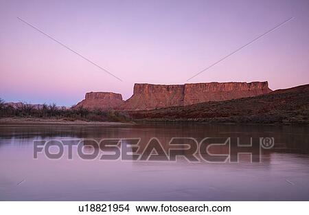 Picture - Cliffs by Colorado River at sunset in Utah, USA. Fotosearch