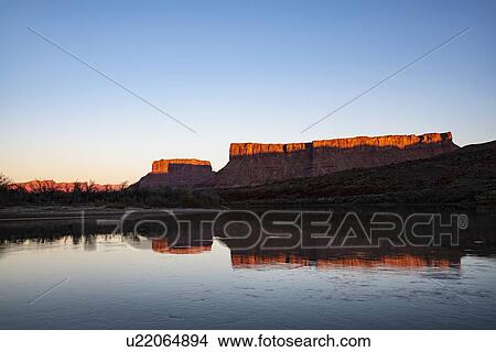 Picture - Cliffs by Colorado River at sunset in Utah, USA. Fotosearch