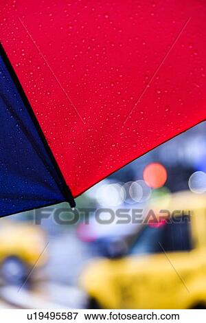 Stock Photo - Close up of umbrella on rainy day. Fotosearch