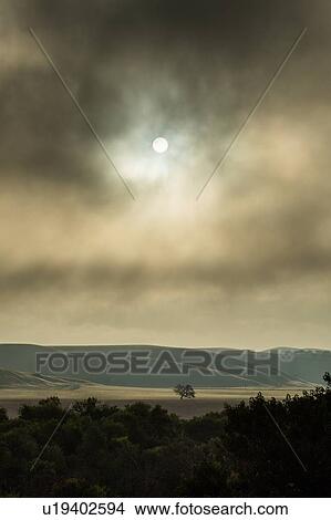 Picture - Cloudscape at sunset over landscape in Santa Margarita, California, USA. Fotosearch