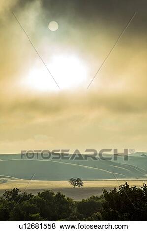 Stock Photo - Cloudscape at sunset over landscape in Santa Margarita, California, USA. Fotosearch