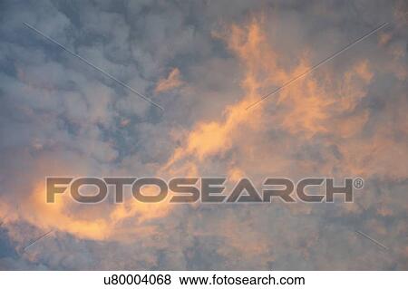 Cloudscape at sunset View Large Photo Image Stock Photo - Cloudscape at sunset. Fotosearch