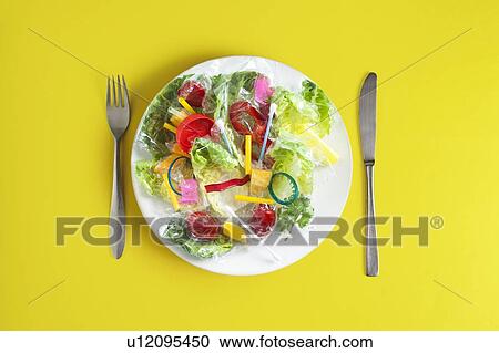 Conceptual image of plastic pollution entering the food chain. View Large Photo Image Stock Image - Conceptual image of plastic pollution entering the food chain.. Fotosearch