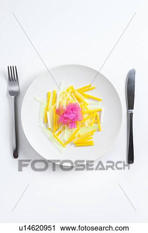 Stock Image - Conceptual image of plastic pollution entering the food chain.. Fotosearch