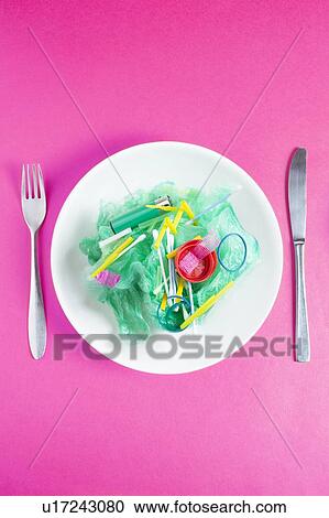 Stock Image - Conceptual image of plastic pollution entering the food chain.. Fotosearch