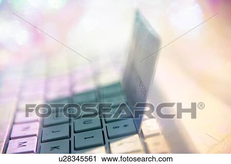 Credit card on computer keyboard View Large Photo Image Stock Image - Credit card on computer keyboard. Fotosearch