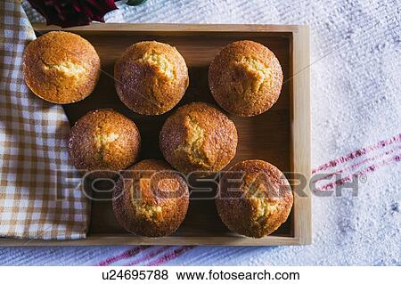Cupcakes on wooden tray View Large Photo Image Stock Photo - Cupcakes on wooden tray. Fotosearch