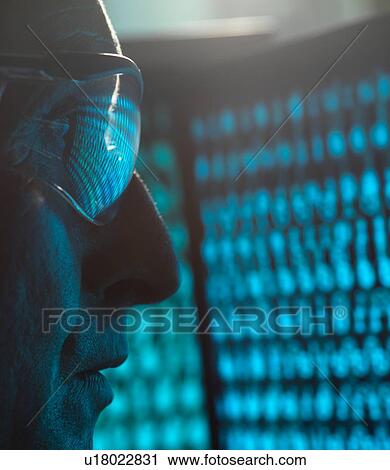 Cyber Security, Man looking at computer screen which is being infected by a virus, close up View Large Photo Image Stock Image - Cyber Security, Man looking at computer screen which is being infected by a virus, close up. Fotosearch