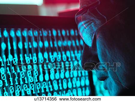 Cyber Security, Man looking at computer screen which is being infected by a virus View Large Photo Image Stock Photograph - Cyber Security, Man looking at computer screen which is being infected by a virus. Fotosearch