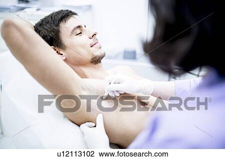 Dermatologist marking the underarm for botox injection to treat excessive sweating, close-up. View Large Photo Image Stock Image - Dermatologist marking the underarm for botox injection to treat excessive sweating, close-up.. Fotosearch